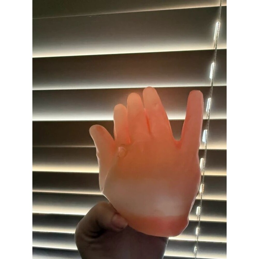 Cool art piece pink wax hand sculpture